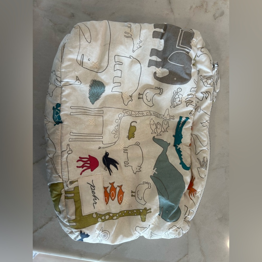 Pehr on the go pouch and portable diaper changing pad.